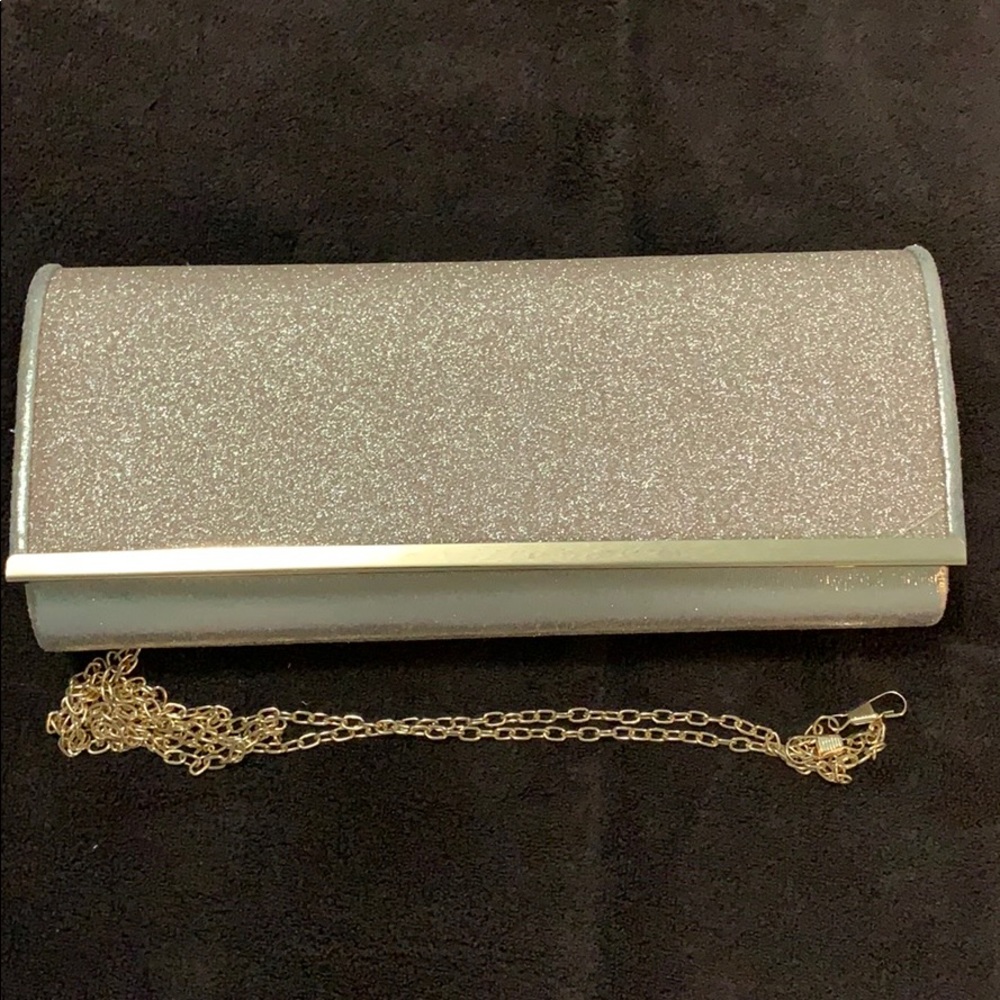 Gold glittery clutch